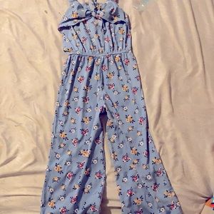 Beautiful color Blue and with Flowers that are colored yellow red and  white